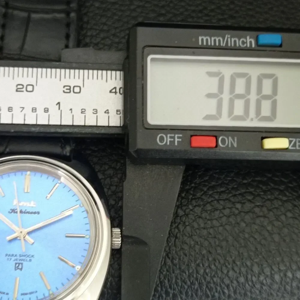 Vintage 1982 HMT Manual Wound Mens Silver Watch & Blue accents